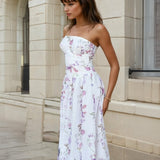 Woman wearing a strapless floral dress