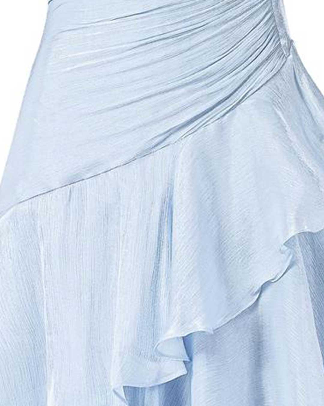 Close-up of a light blue draped skirt with layered ruffles and a gathered waist, shown against a plain white background.