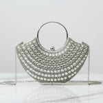 Silver handbag with chain strap on a white background