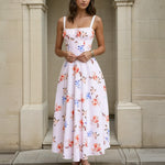 Woman wearing a midi floral dress 