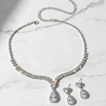 orbit silver necklace earrings