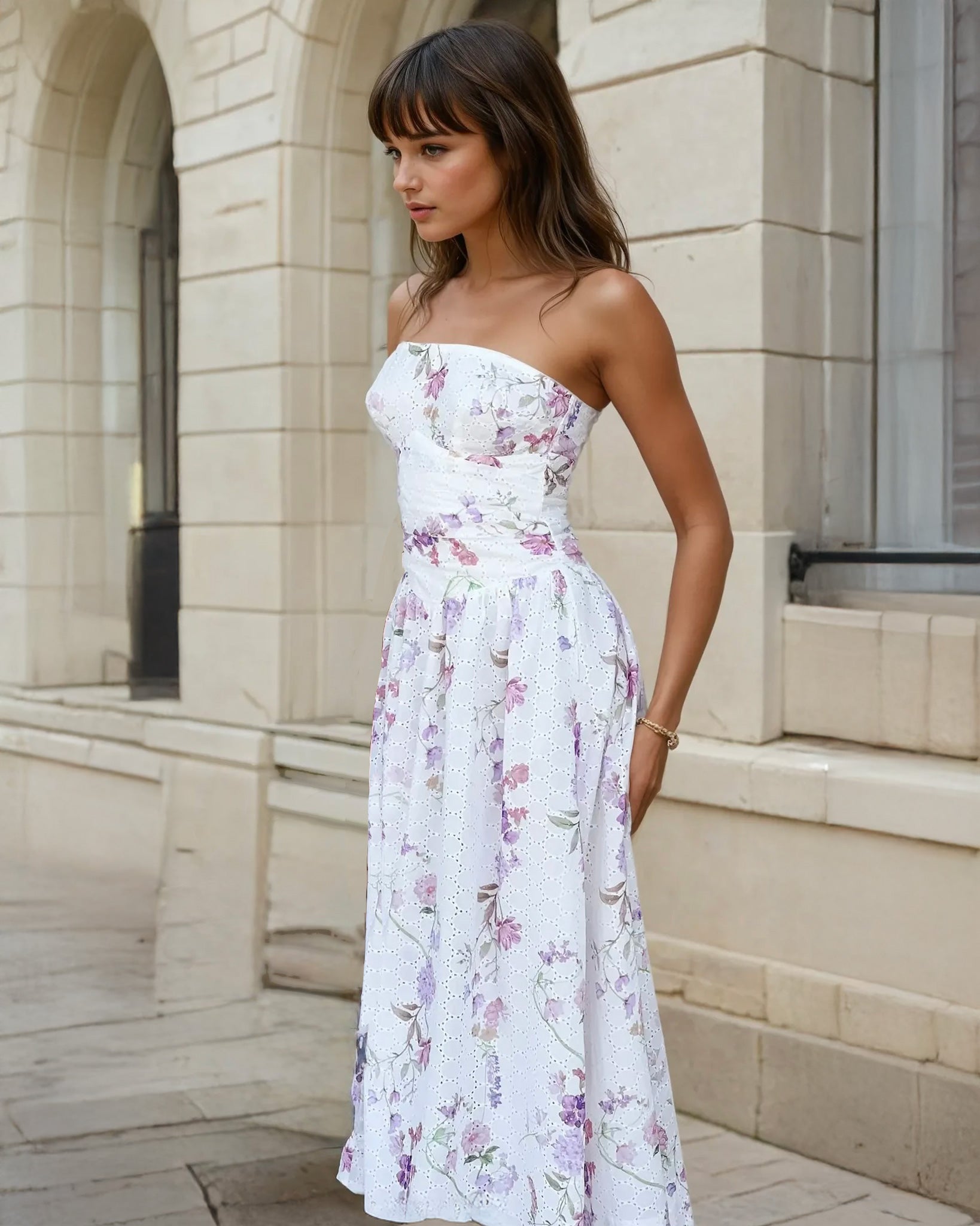 Woman wearing a strapless floral dress 